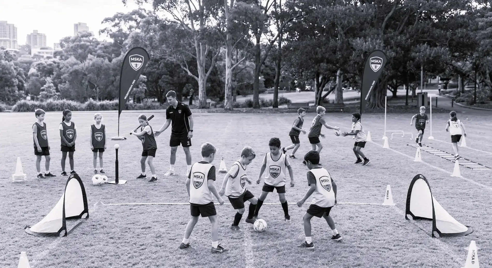 Kids doing after school sports and athletic development drills